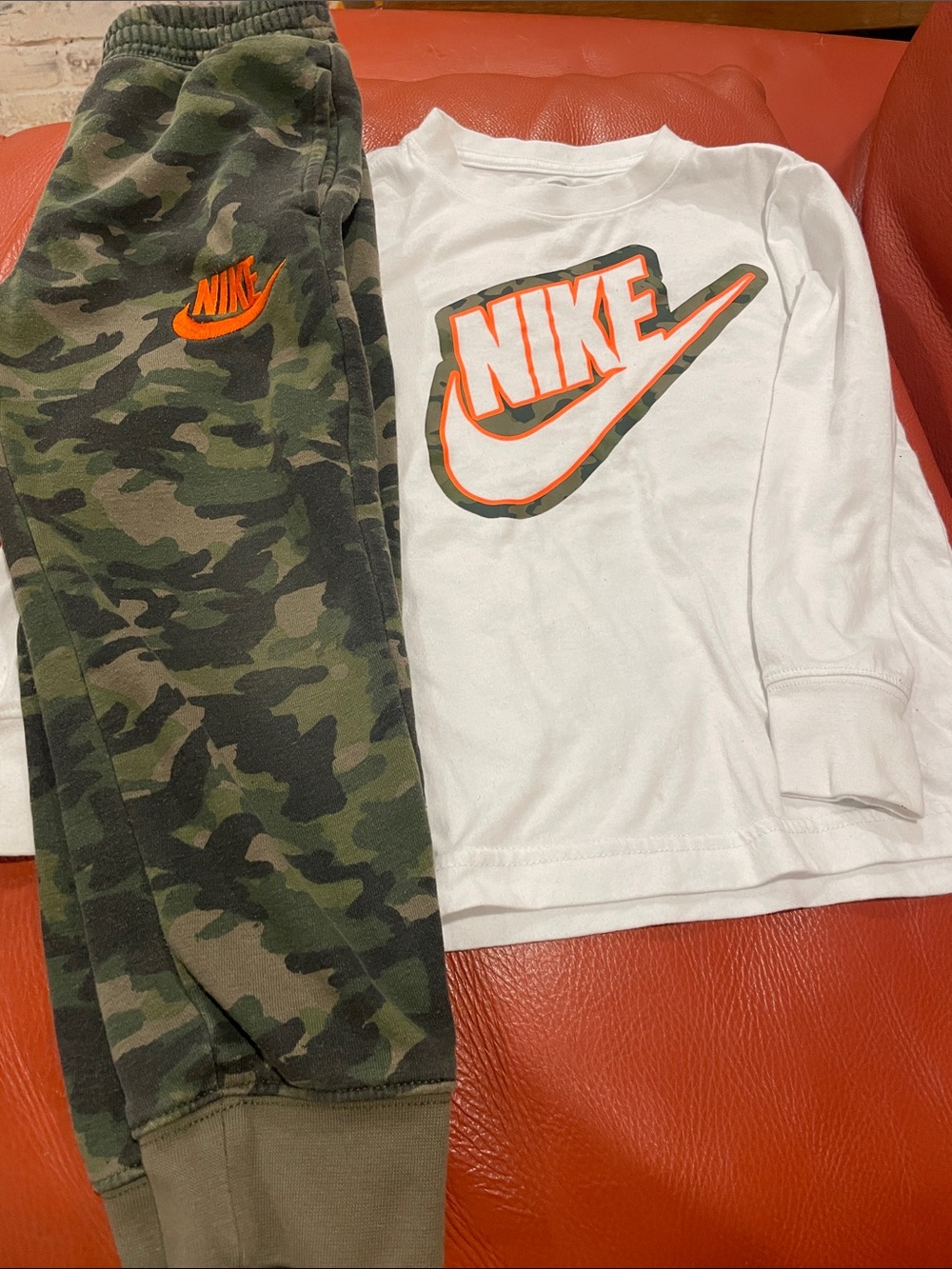 Nike Kids Camo Sweatpants with Orange Logo with matching long sleeve Nike shirt
